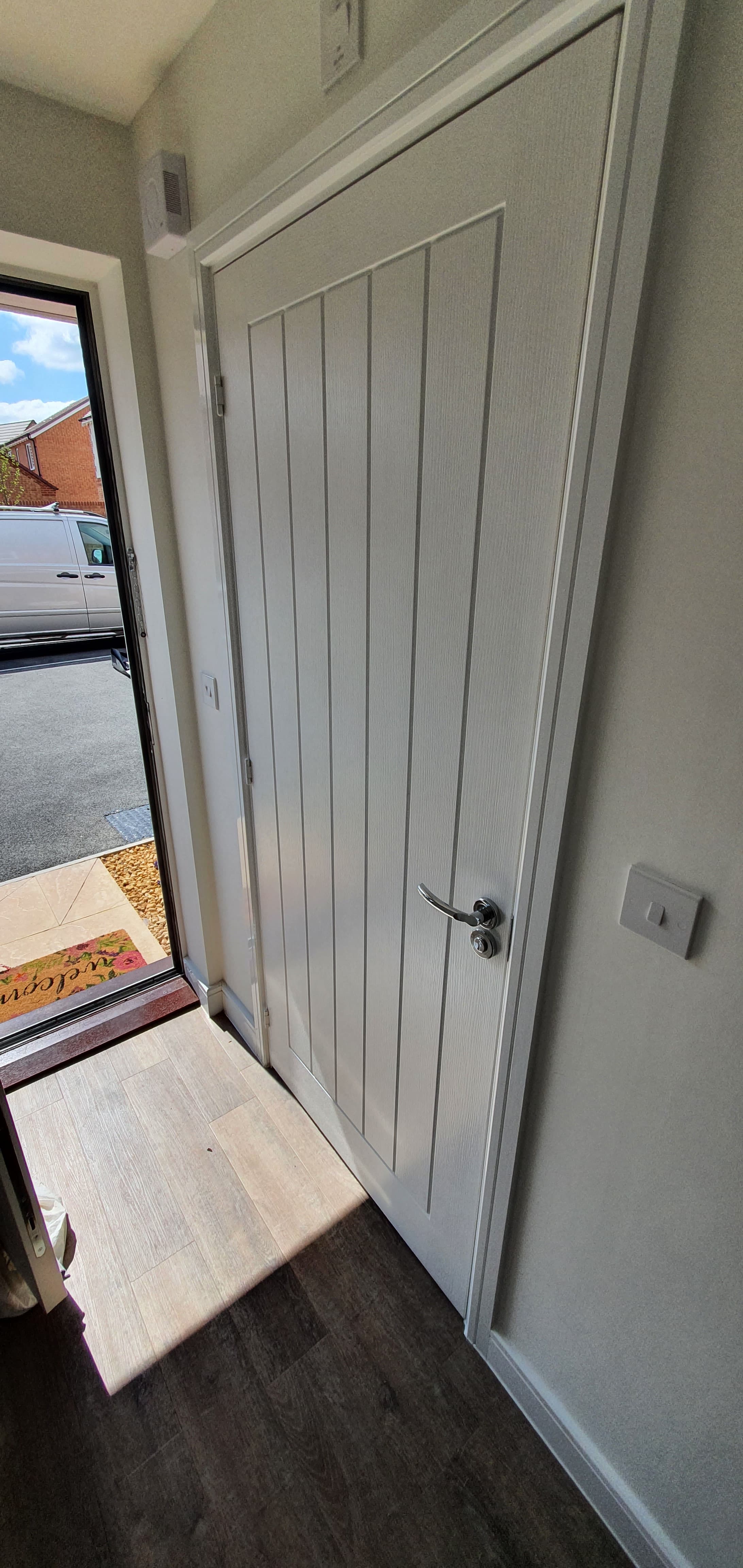White internal door beside the entrance to the Southam garage conversion