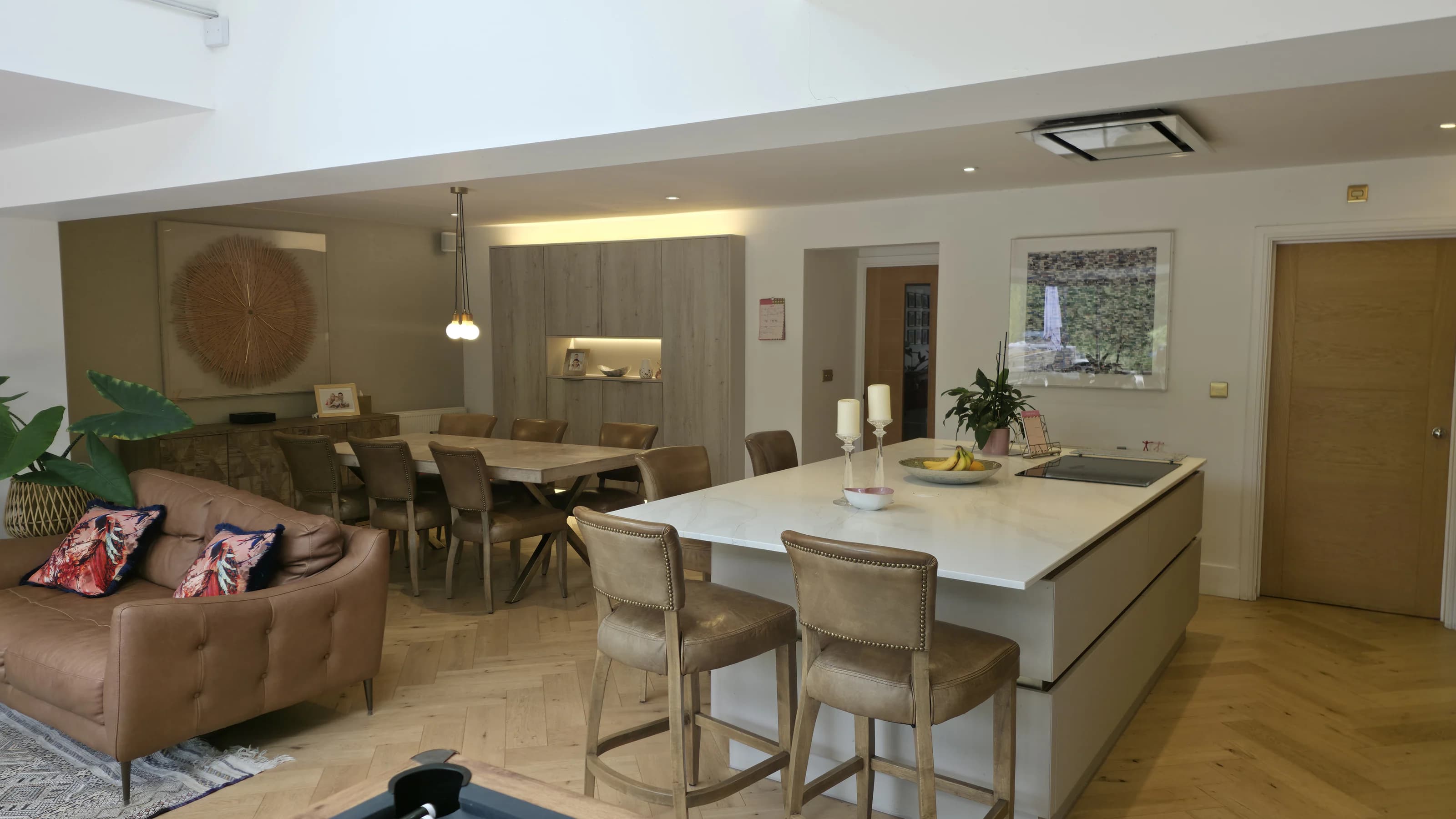 Completed open-plan kitchen, dining and living space with a central island